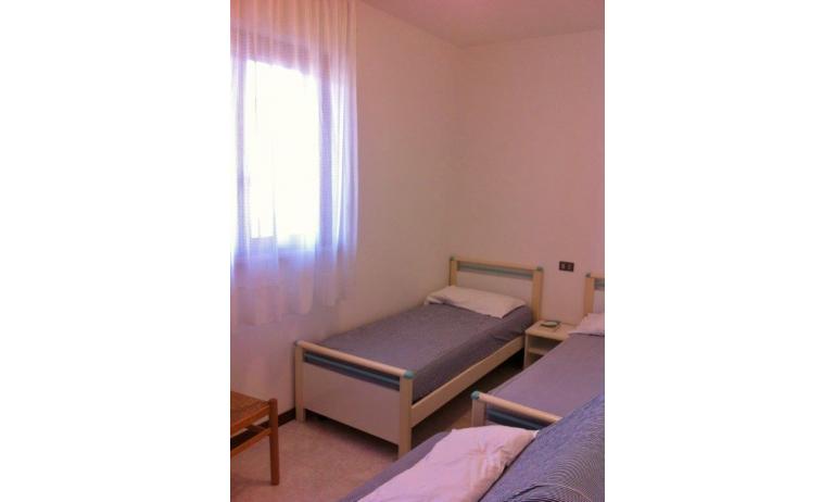 appartament DUCA DEGLI ABRUZZI: C7 - chambre avec deux lits (exemple)