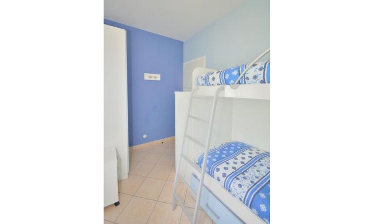 apartments VILLAGGIO MICHELANGELO: C6 - bedroom with bunk bed (example)