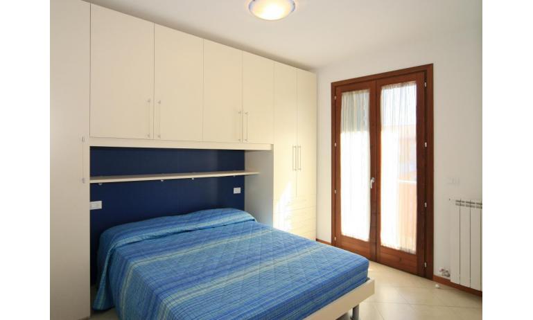 résidence VILLAGGIO DEI FIORI: C6 - chambre à coucher double (exemple)
