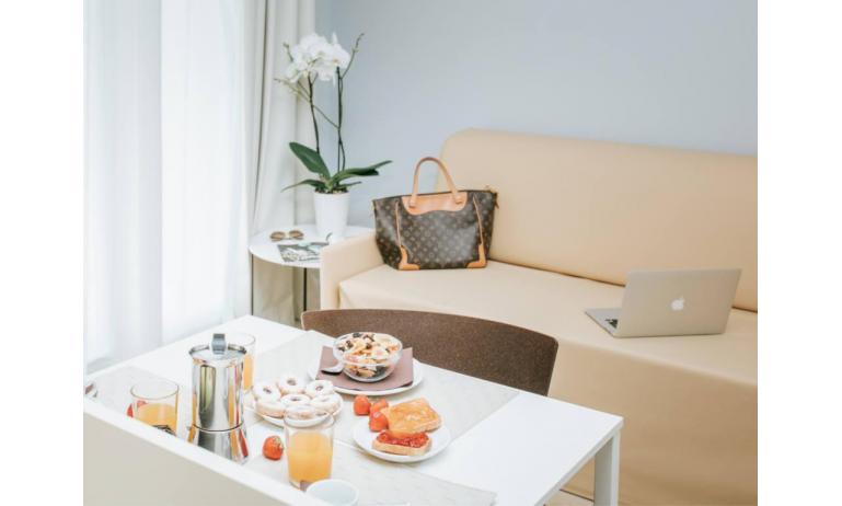 aparthotel TOURING: A - distribuzione appartamento (esempio)