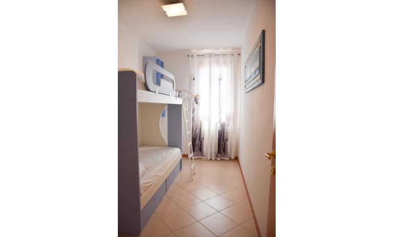 Residence MILANO DUNE: C6 - Schlafzimmer mit Stockbett (Beispiel)