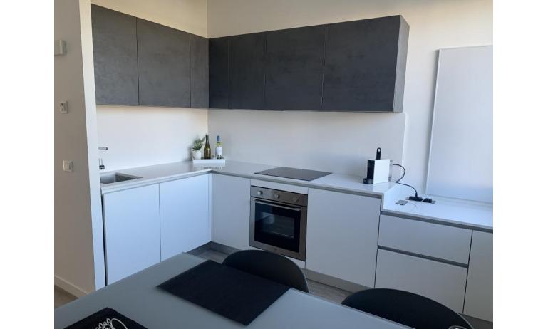 appartamenti TERRAMARE: E8/VSM - angolo cottura (esempio)