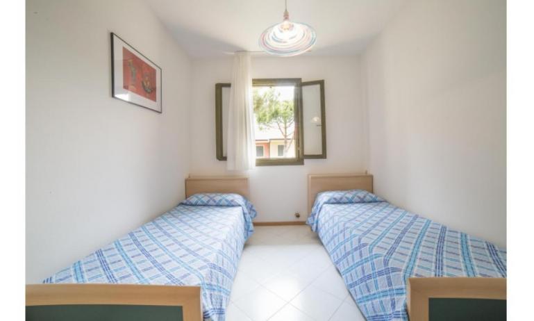résidence PORTO SOLE: D6 - chambre avec deux lits (exemple)