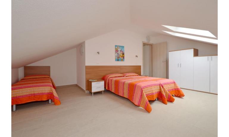 apartments FIORE: B4 - mansard roof bedroom (example)